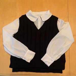 Christian Siriano, black cable knit cotton fooler sweater vest.
Large, EUC